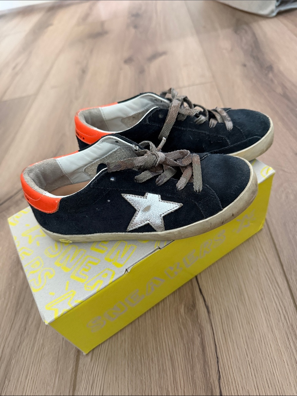 Kids Black Suede Sneakers with Orange Heel and White Star